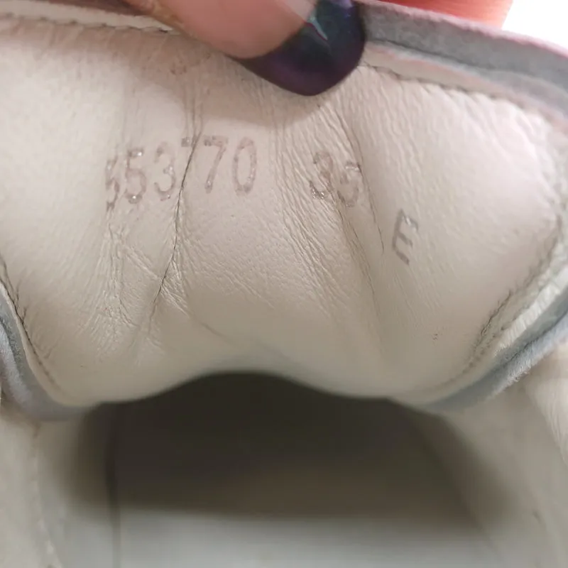 Alexander McQueen Sneakers surdimensionnées en cuir blanc et daim rose vif taille 35