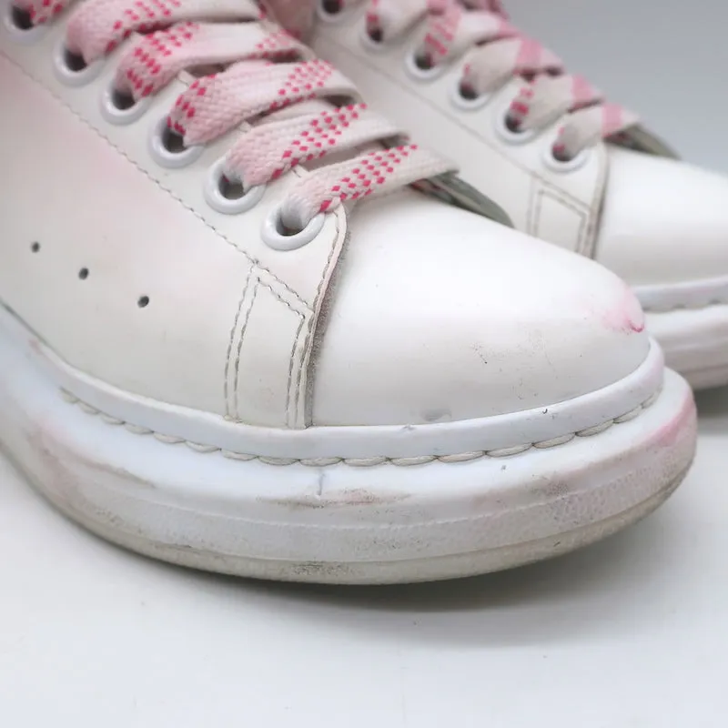 Alexander McQueen Sneakers surdimensionnées en cuir blanc et daim rose vif taille 35